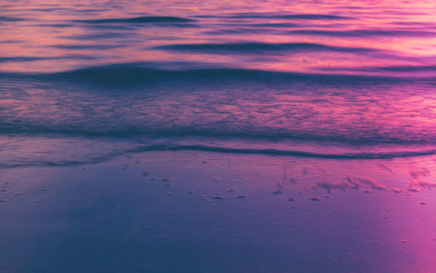 istock Blurred Pink and Purple Waves in Motion Closeup Backgrounds 1207109927
