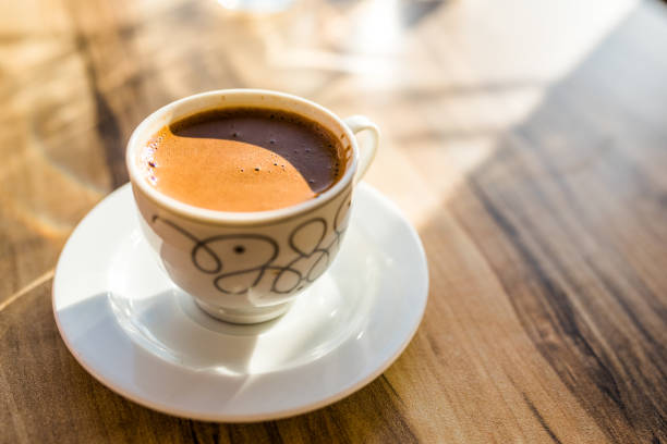 istock Turkish coffee on a wooden cafe table 1207110812