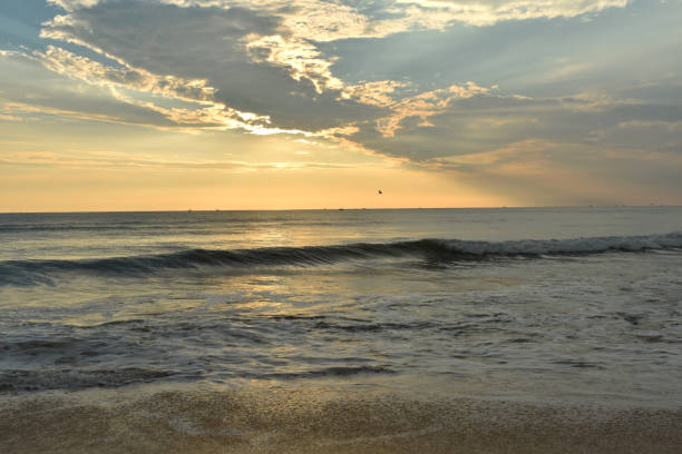 istock a beautiful sunset in a beach in goa, India 1207110887