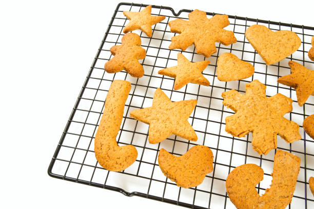 istock Christmas cookies on rack isolated 1207112247