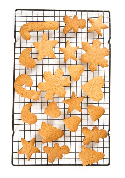 istock Christmas cookies on rack isolated 1207112261