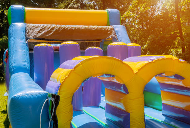 istock Jumps on a big inflatable trampoline. 1207112691
