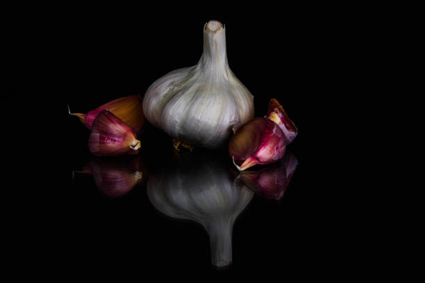 istock Garlic photographed in the studio for promotion - reflective 1207112907