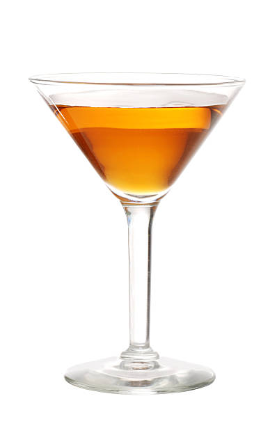 istock Orange martini in a martini glass against a white background 120711365