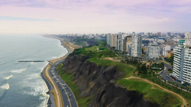 Oil painted panoramic aerial view of Miraflores district coastline in Lima, Peru Panoramic aerial view of Miraflores district coastline in Lima, Peru during the summer lima peru stock pictures, royalty-free photos & images