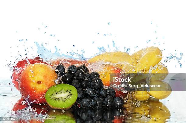 A Variety Of Fruits In A Splash Of Water Stock Photo - Download Image Now - Banana, Bubble, Clean