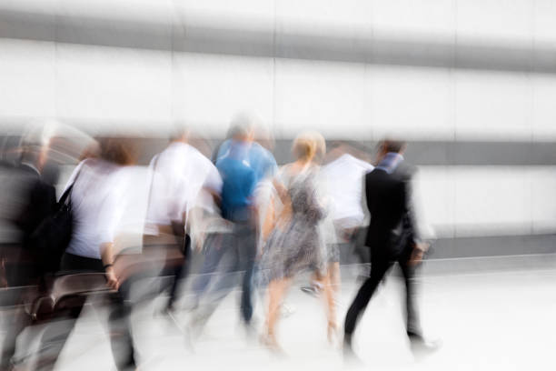 istock Group of walking business people 1207120906