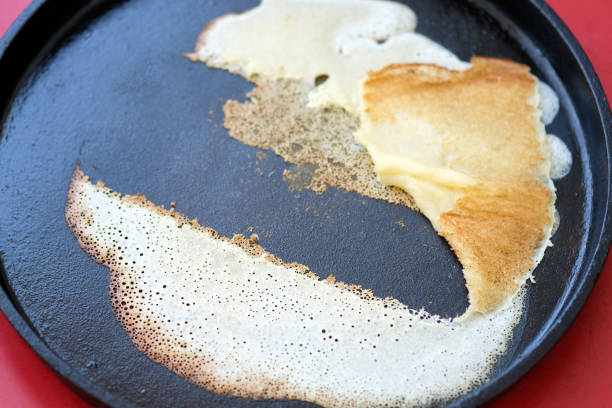 istock Pancake stuck to a pan for baking pancakes 1207121832