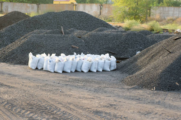 istock On the ground are mountains of black coal. 1207121834