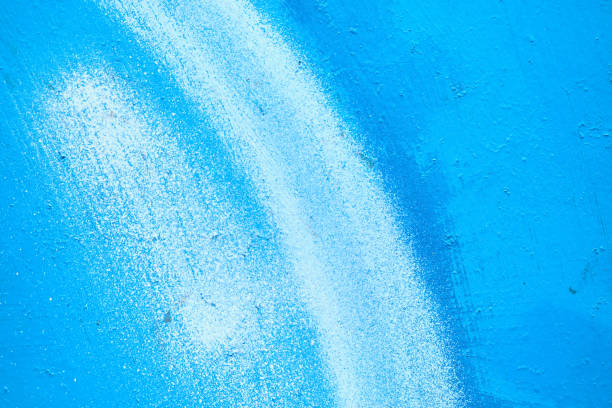 istock Abstract metal texture painted with a brush of blue and white. 1207121982