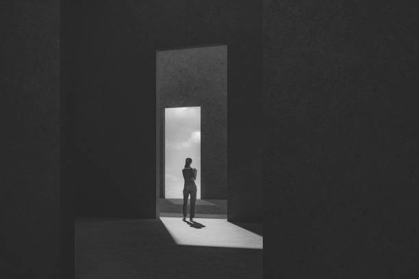 Woman standing between passages Woman standing between passages. This is entirely 3D generated image. light at the end of the tunnel photos stock pictures, royalty-free photos & images