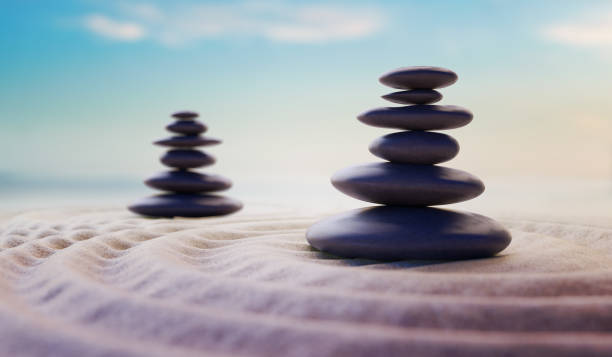 istock Zen-like balanced stones in stack. Harmony and meditation concept. 3D rendered illustration. 1207125587