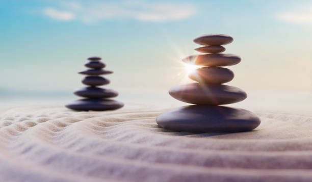 istock Zen-like balanced stones in stack. Harmony and meditation concept. 3D rendered illustration. 1207125637