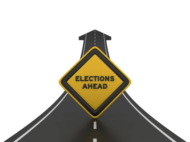 istock Road Arrow with ELECTIONS AHEAD Road Sign - 3D Rendering 1207127130
