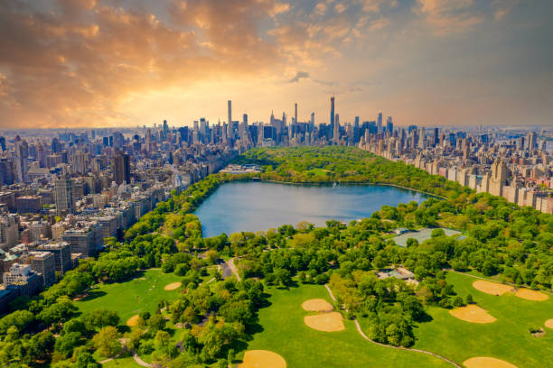 Aerial view of Manhattan New York looking south up Central Park Aerial view of Manhattan New York looking south up Central Park during epic sunset over the city. central park manhattan stock pictures, royalty-free photos & images