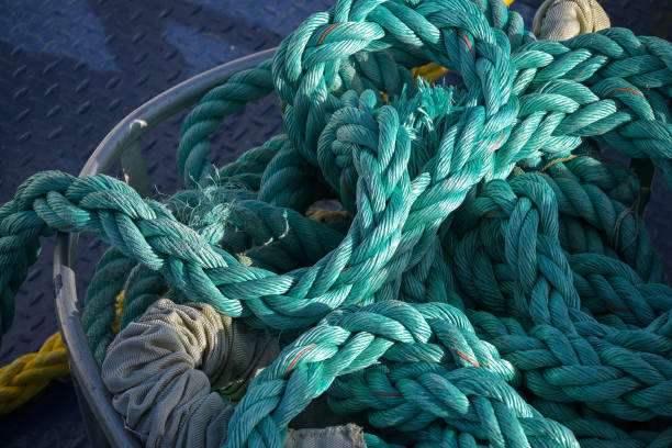 istock turquoise ship ropes and rigging in a metal basket on a boat 1207129337