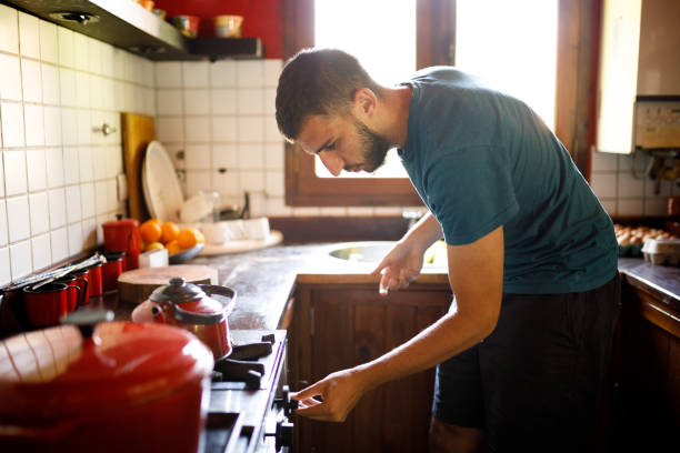 Young man preparing a Chimarrão.