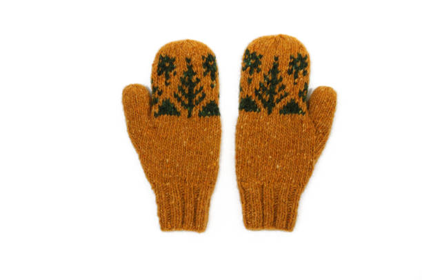 istock Yellow knitted mittens. View from above. 1207130574