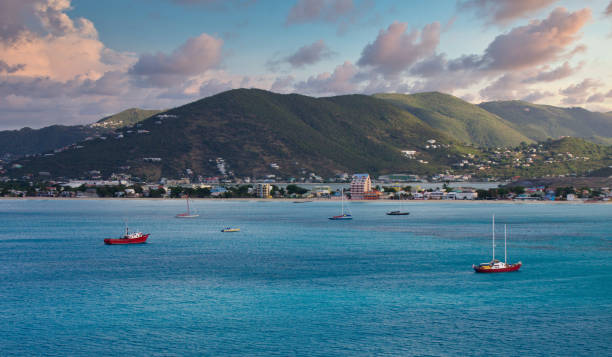 istock Red Boats in Afternoon Bay 1207131693
