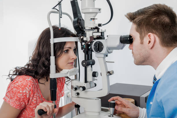 istock Ophthalmologist examines the patient in hospital 1207133744