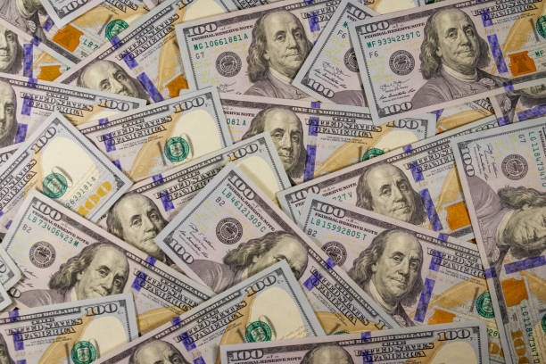 istock Background of american one hundred dollar bills 1207136478