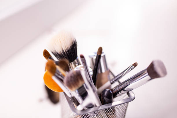 istock Set of a cosmetic brushes. Makeup brushes on a white background 1207139761