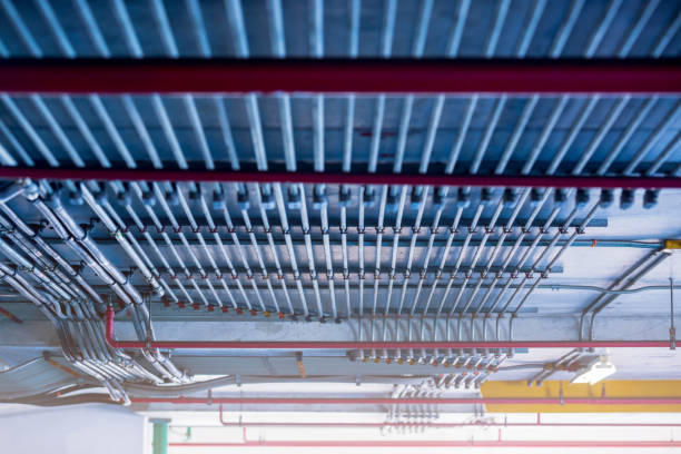 istock Blurry picture of electrical conduit and cabling. 1207142709