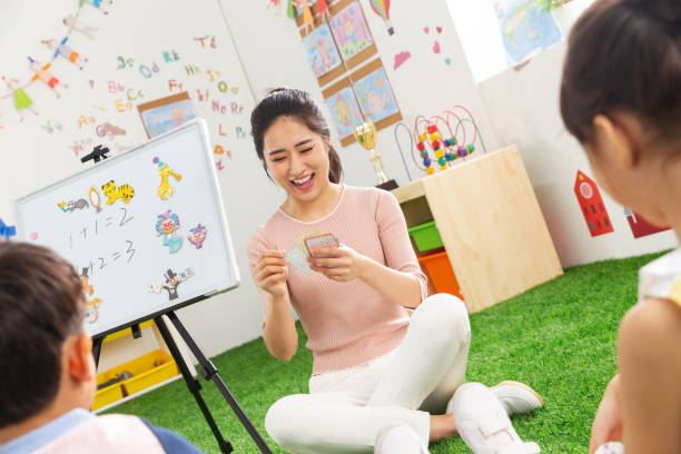 istock Kindergarten teachers and the children 1207151402