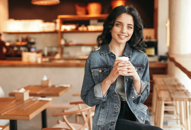 istock Coffee lover relaxing in cafe 1207153542