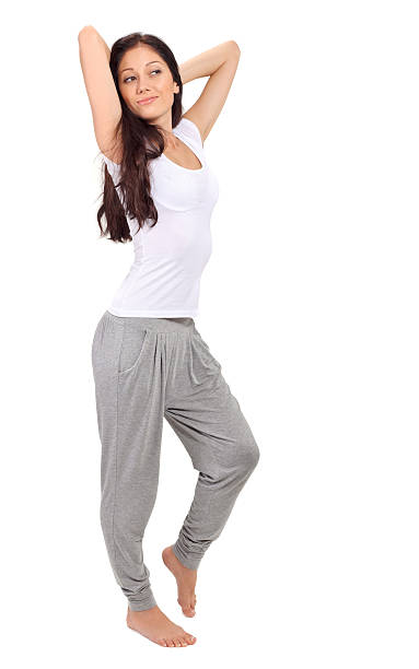 istock Young beautiful brunette girl stretching after awaking 120715491