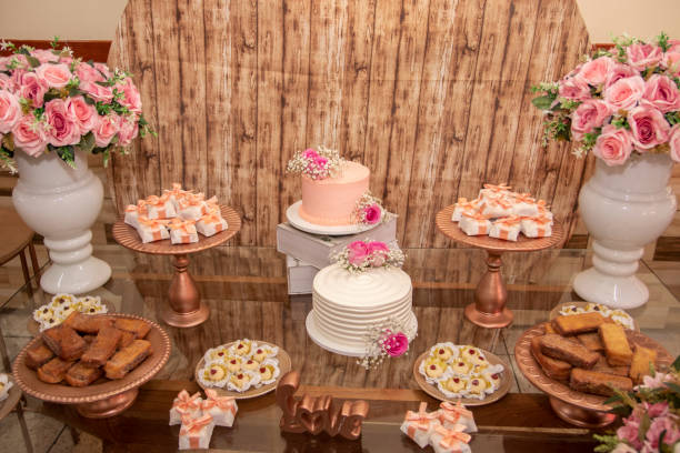istock Wedding Setup. Cake table with sweet, decoration and flowers 1207156478