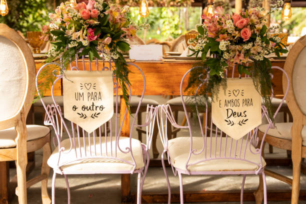 istock Wedding Setup. Banquet with table and chairs. Decoration, flowers, ware, glass 1207156527