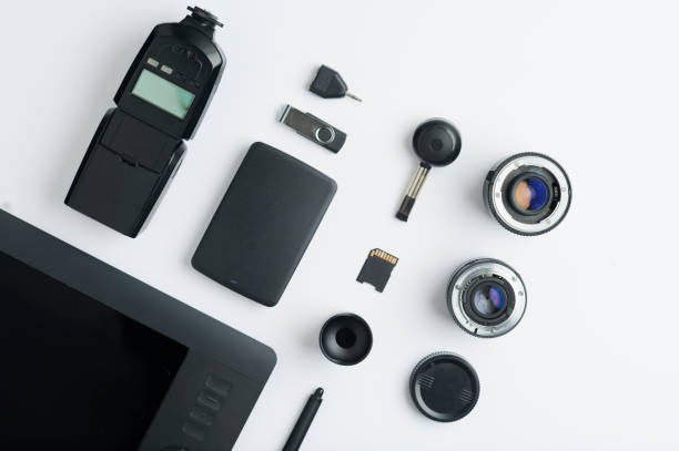 istock Flat assembly composition with photographic production equipment, with  writing space, on white background. Top view 1207158207