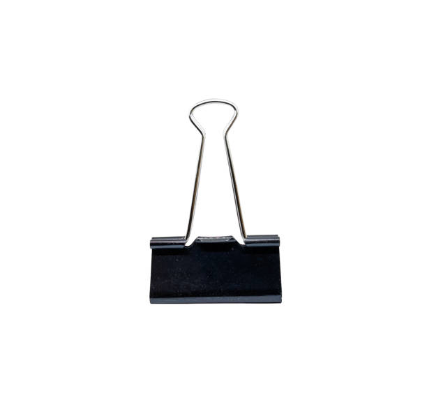 istock single black binder clip isolated on white background. Clerical clip for paper 1207160101
