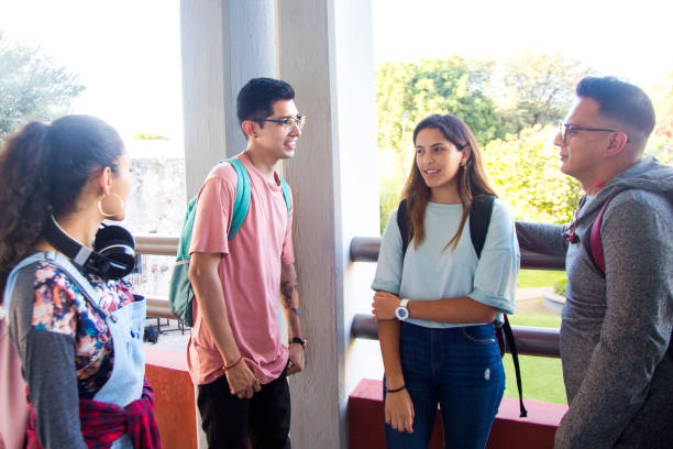 istock Out-of-class Latino college students 1207162092