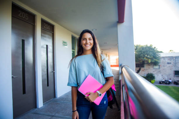 istock Latino college student out of class 1207162140