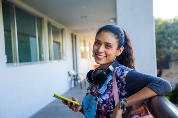 istock Latino college student out of class 1207162142
