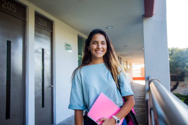 istock Latino college student out of class 1207162159