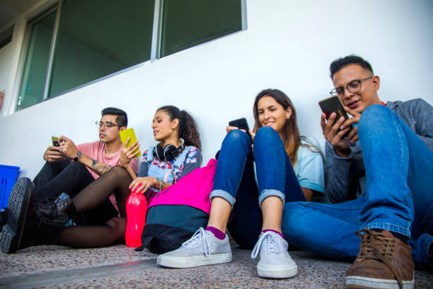 istock Out-of-class Latino college students 1207163325