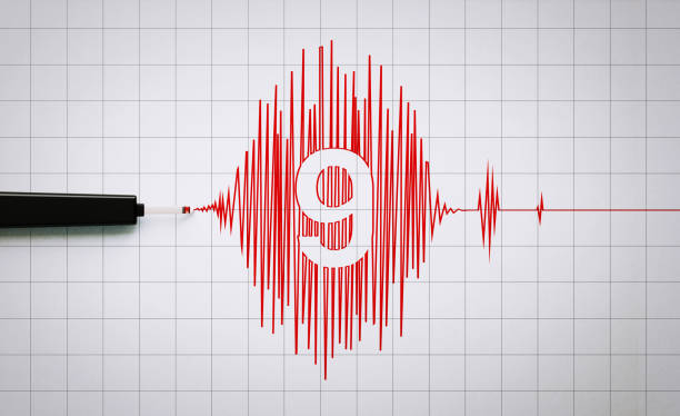 istock Seismograph Recording a Magnitude Nine Earthquake Activity in Richter Scale on Grid Paper 1207163438