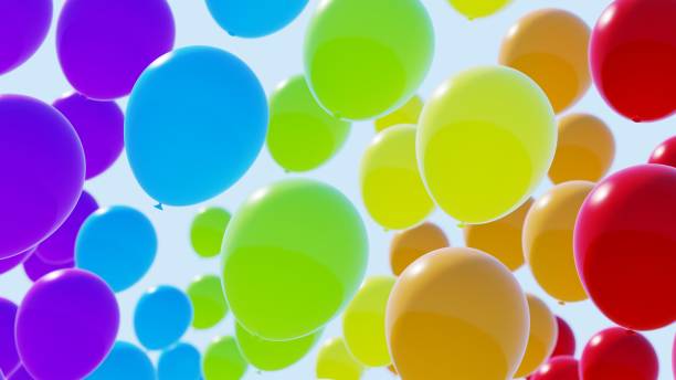 istock Colorful balloons on blue sky. 1207164249