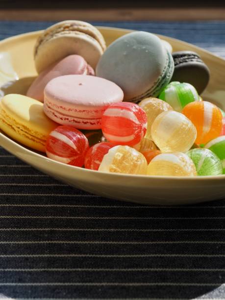 istock Red, yellow, green circle shaped candy and macaroons 1207168035