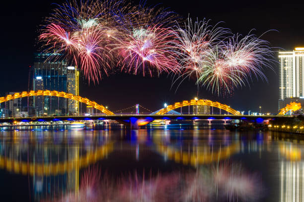 istock View of Da Nang at night with fireworks and lights. 1207170081