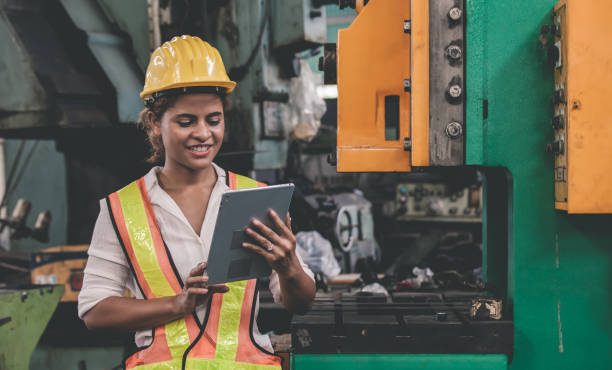 istock engineer holding digital tablet in hands while working in manufacturing plant 1207171289