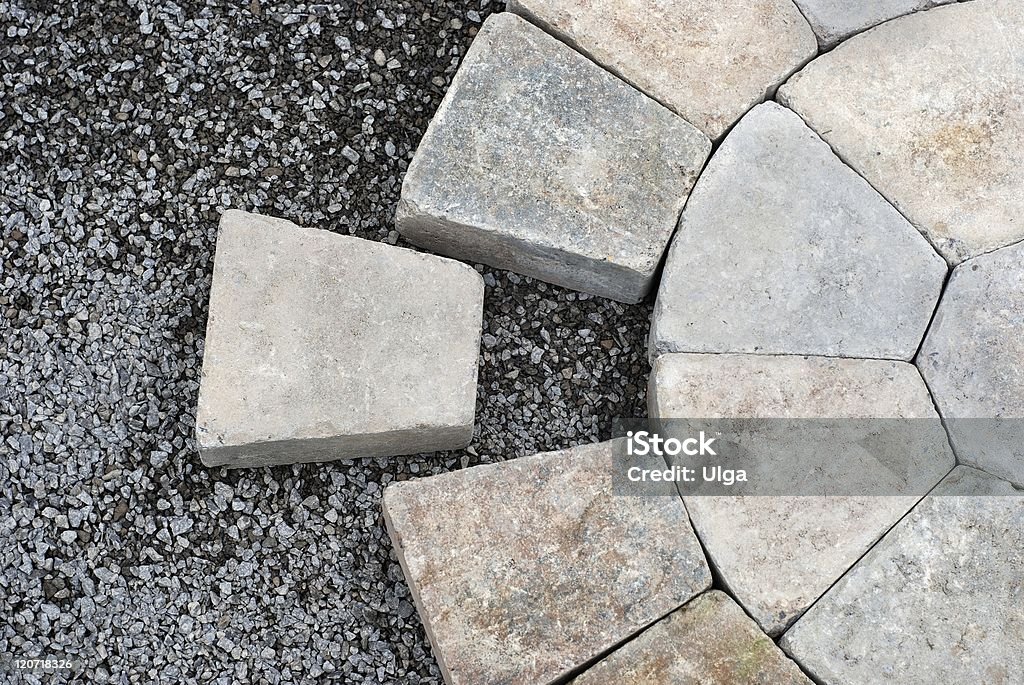 Pavers in a circular pattern Installing decorative pavers in a circular pattern Stone - Object Stock Photo