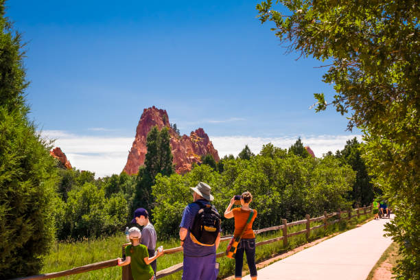 three generations of family enjoying garden of the gods park in colorado springs, colorado - garden of the gods imagens e fotografias de stock