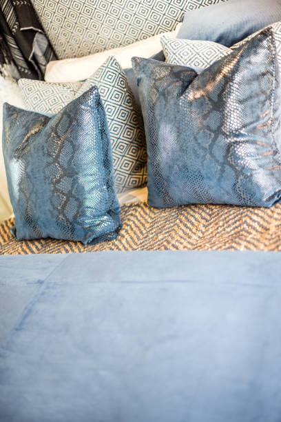 istock A bed with cushions and a blanket 1207184932