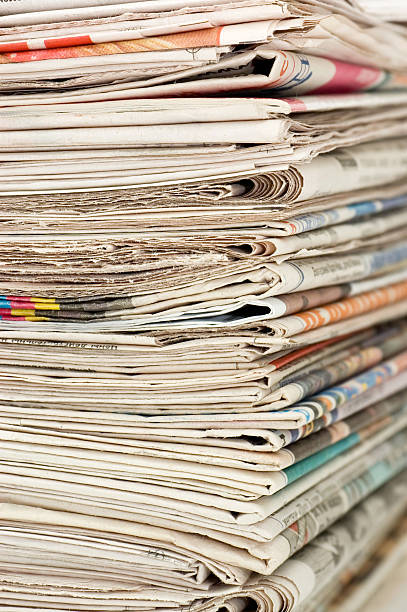 istock Pile of newspapers close up 120718513