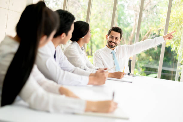 istock Group of Company Employees Plan their Business Strategy 1207188084