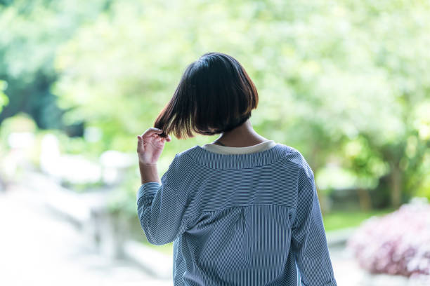 istock Smiling girl outdoor 1207188890